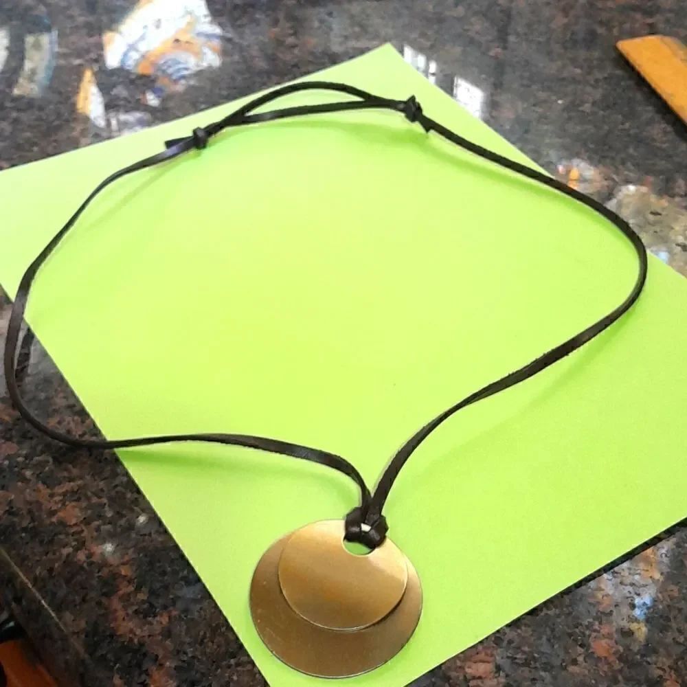 Double Brass Necklace on Leather Cord.